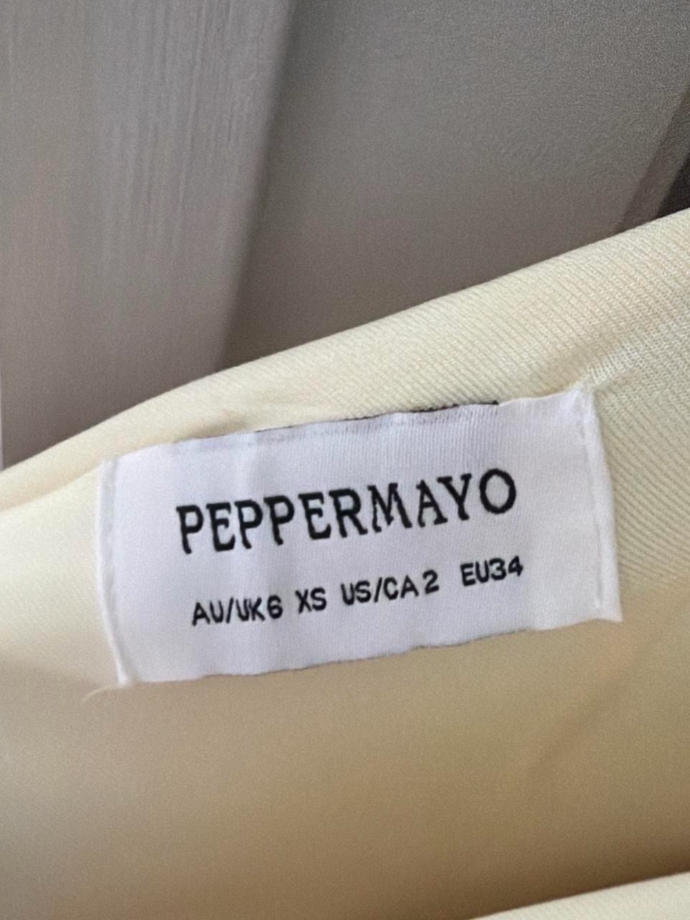 Peppermayo Cream One-Shoulder Halter Twist Dress - Picture 3 of 3